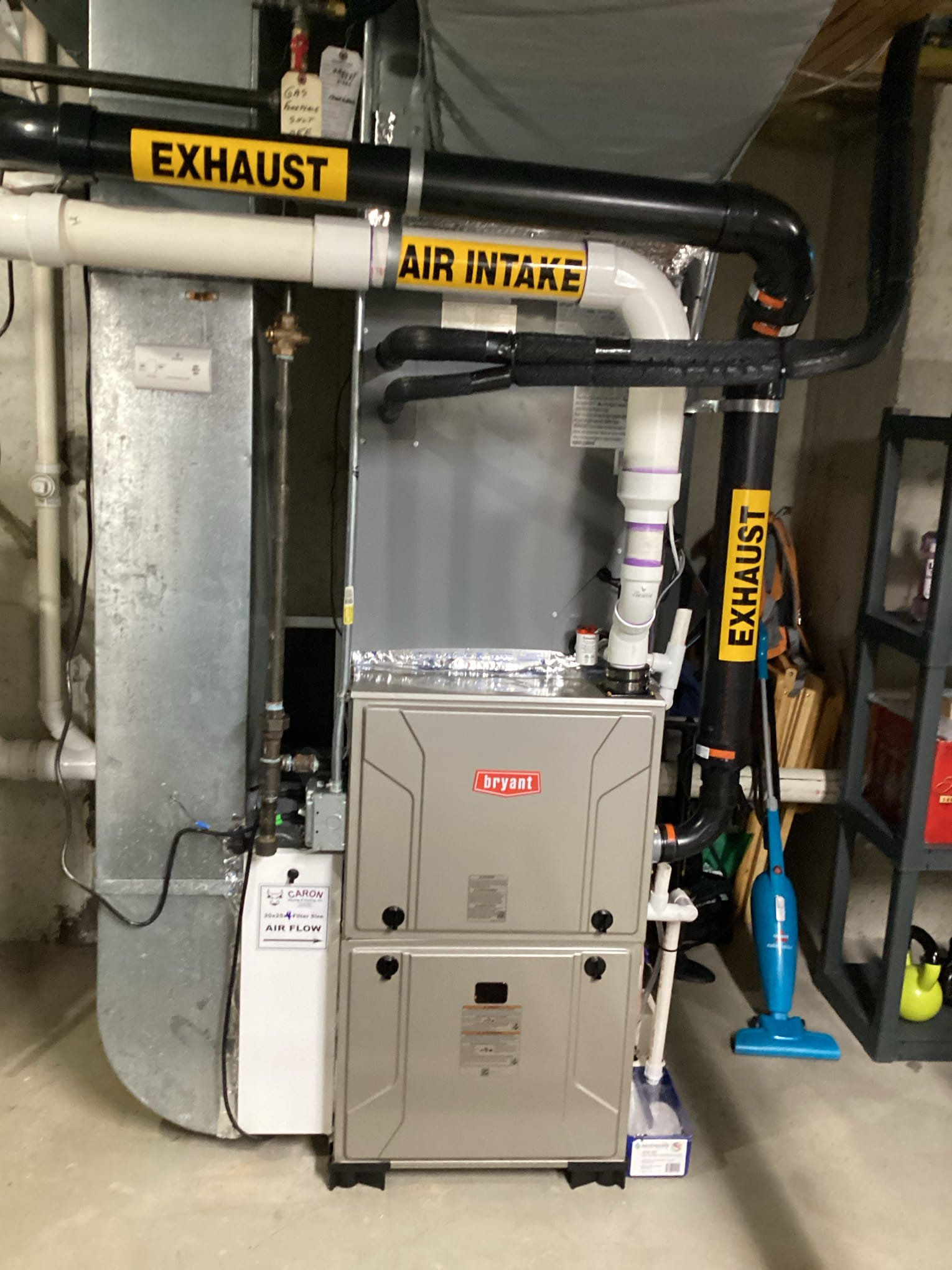 New high-efficiency Bryant gas furnace installed in a home basement by Caron Heating & Cooling