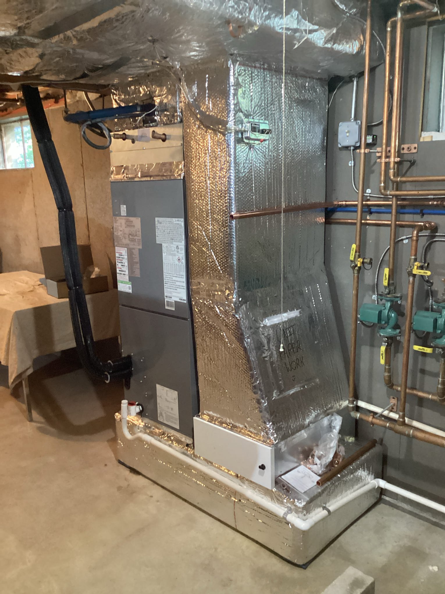 Hydronic heating system with circulator pumps and air handler serviced by Caron Heating & Cooling